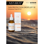 Display Rückwandbild, zweiseitig "Neuheit: Sun Protection Drops SPF 50"